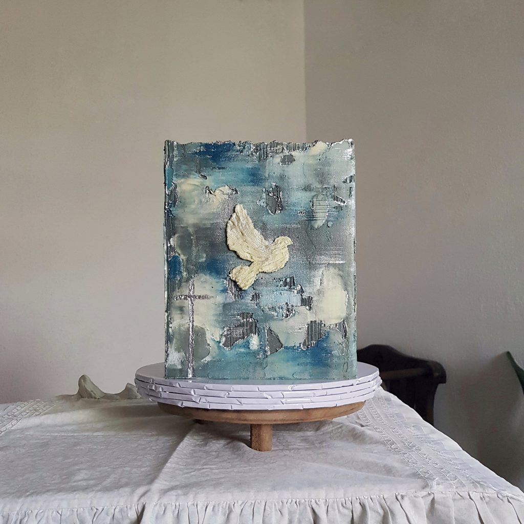 A baby christening cake for a boy 